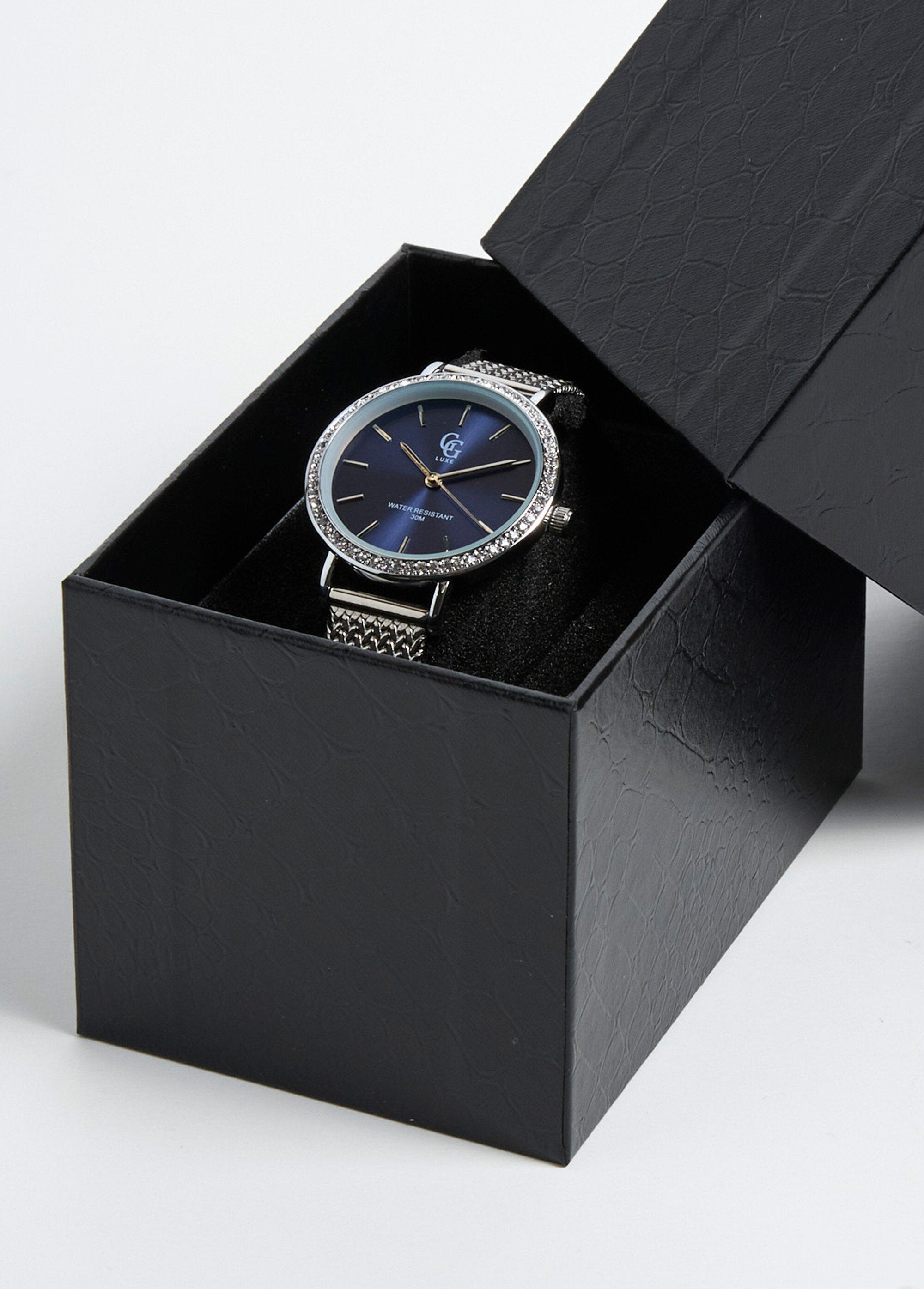 Reloj_redondo_de_acero_inoxidable_con_pedrería._Plata_FA1_slim