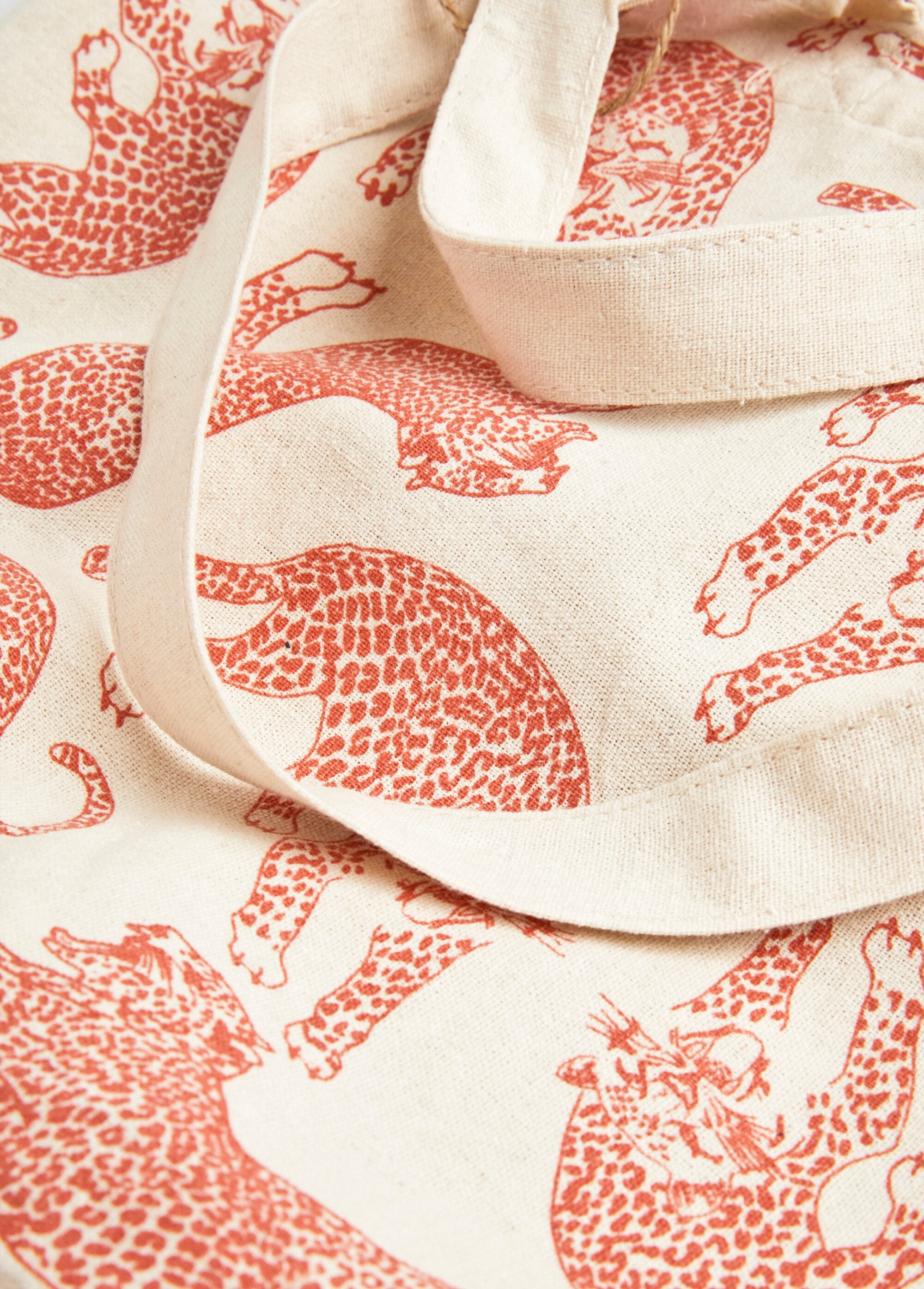 Bolsa_de_tela_estampada_Crudo_y_naranja_DE1_slim