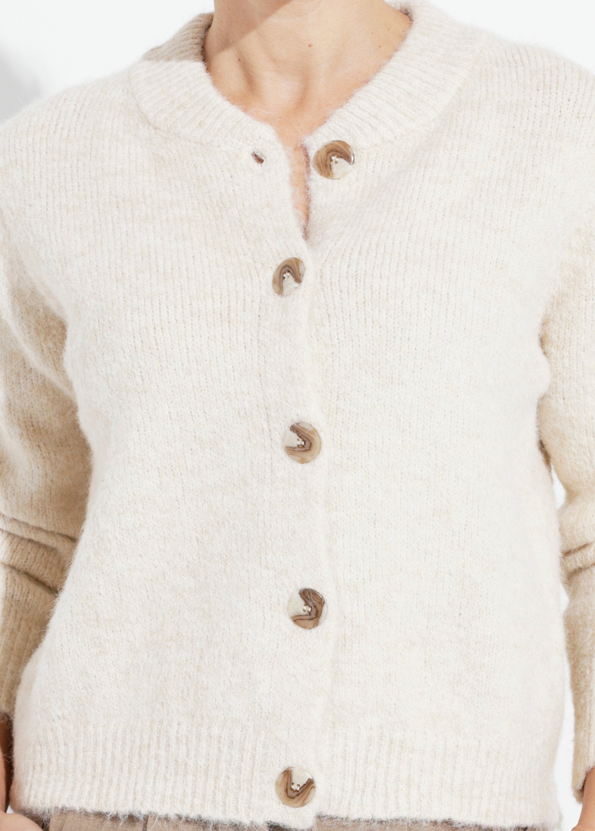 Chaleco_de_punto_elegante_con_cuello_redondo_Beige_DE1_slim